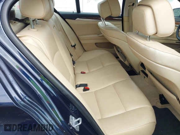 2013 BMW 5 Series 528i xDrive with VIN WBAXH5C52DD115352, listed as a IAAI auction lot 42501265 with 122,421 mi miles and . Bid and sale history available at DreamBid. Image 8.
