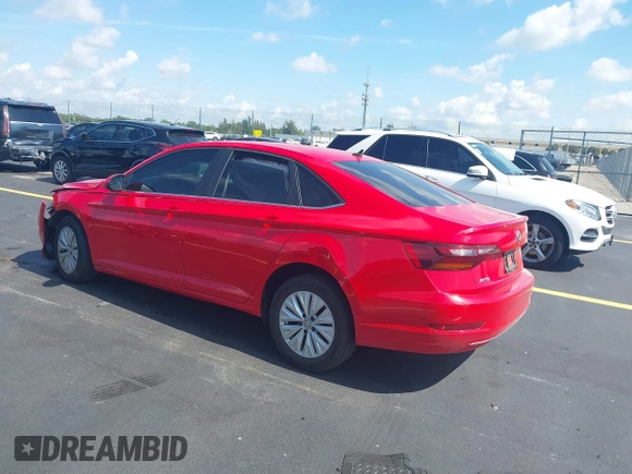 2019 Volkswagen Jetta S z VIN 3VWC57BUXKM029610, wystawiony jako IAAI lot #42334649 z przebiegiem 34 072 mil mil oraz . Historia ofert i sprzedaży dostępna na DreamBid. Obrazek 3.