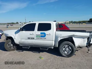 2023 Toyota Tacoma SR with VIN 3TMCZ5AN2PM649123, listed as a IAAI auction lot 41687819 with 44,383 mi miles and . Bid and sale history available at DreamBid. Image 13.