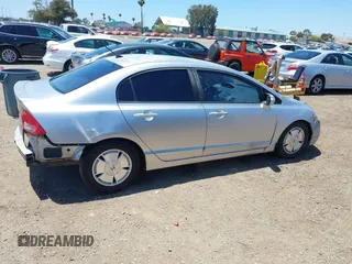 2007 Honda Civic with VIN JHMFA36257S021635, listed as a IAAI auction lot 42315202 with 233,394 mi miles and . Bid and sale history available at DreamBid. Image 14.