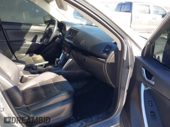 2013 Mazda CX-5 Grand Touring with VIN JM3KE4DE4D0168115, listed as a IAAI auction lot 41610004 with 190,690 mi miles. Bid and sale history available at carsss.com. Image 5.