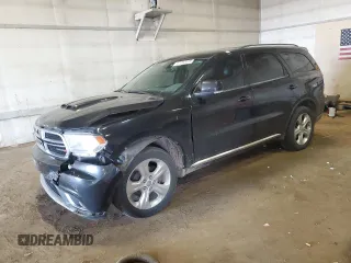 2014 Dodge Durango Limited with VIN 1C4RDJDG7EC388679, listed as a Copart auction lot 57232015 with 268,704 mi miles and Clean title. Bid and sale history available at DreamBid. Image 1.
