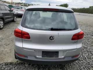 2014 Volkswagen Tiguan S z VIN WVGBV3AX7EW545782, wystawiony jako Copart lot #58711824 z przebiegiem 62 616 mil mil oraz Szkoda całkowita • Salvage title. Historia ofert i sprzedaży dostępna na DreamBid. Obrazek 6.