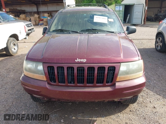 1999 Jeep Grand Cherokee Limited with VIN 1J4GW68N8XC595697, listed as a IAAI auction lot 41917466 with 177,944 mi miles. Bid and sale history available at carsss.com. Image 6.