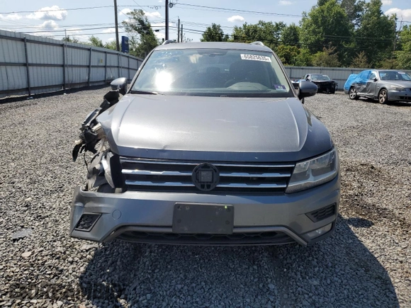 2018 Volkswagen Tiguan SEL z VIN 3VV2B7AX5JM065899, wystawiony jako Copart lot #65825635 z przebiegiem 115 677 mil mil oraz Szkoda całkowita • Salvage title. Historia ofert i sprzedaży dostępna na DreamBid. Obrazek 5.