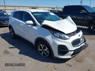 2021 Kia Sportage LX with VIN KNDPM3AC8M7932425, listed as a IAAI auction lot 39067549 with 56,841 mi miles. Bid and sale history available at carsss.com. Image 1.