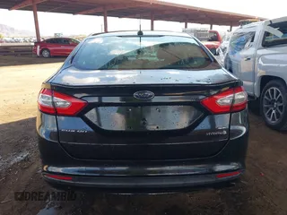 2014 Ford Fusion SE Hybrid with VIN 3FA6P0LUXER291754, listed as a IAAI auction lot 42415936 with 154,474 mi miles and . Bid and sale history available at DreamBid. Image 16.
