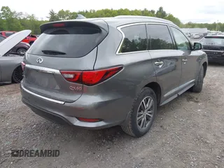 2020 Infiniti QX60 Luxe with VIN 5N1DL0MM1LC537478, listed as a IAAI auction lot 42323321 with 51,464 mi miles and . Bid and sale history available at DreamBid. Image 4.