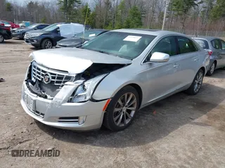 2013 Cadillac XTS Luxury z VIN 2G61P5S33D9170453, wystawiony jako IAAI lot #41928607 z przebiegiem 68 094 mil mil oraz . Historia ofert i sprzedaży dostępna na DreamBid. Obrazek 17.