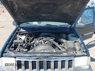 1995 Jeep Grand Cherokee Laredo with VIN 1J4GZ58Y2SC669152, listed as a IAAI auction lot 42077067 with 134,022 mi miles. Bid and sale history available at carsss.com. Image 10.