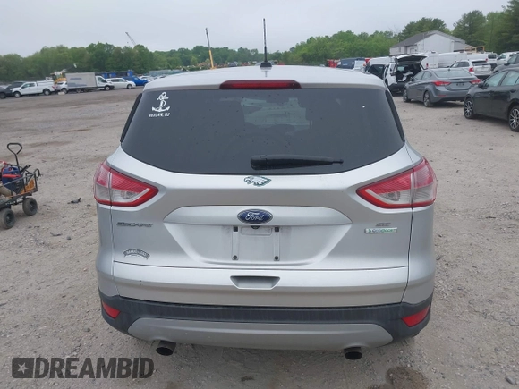 2015 Ford Escape SE z VIN 1FMCU0G73FUB10414, wystawiony jako IAAI lot #42173063 z przebiegiem 120 200 mil mil oraz . Historia ofert i sprzedaży dostępna na DreamBid. Obrazek 17.