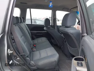 2007 Honda Pilot LX with VIN 5FNYF281X7B006877, listed as a IAAI auction lot 41595667 with 255,799 mi miles. Bid and sale history available at carsss.com. Image 8.