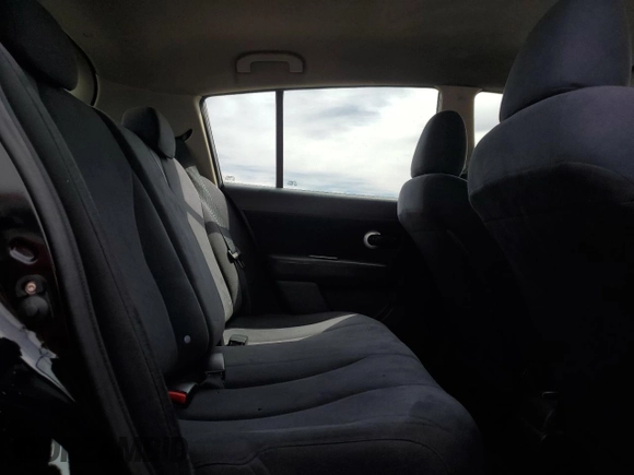 2009 Nissan Versa S with VIN 3N1BC13E49L363630, listed as a Copart auction lot 53118515 with 135,573 mi miles and Salvage Title. Bid and sale history available at DreamBid. Image 11.