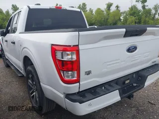 2023 Ford F-150 XL with VIN 1FTEW1CP0PKD52884, listed as a IAAI auction lot 41780292 with 60,103 mi miles and . Bid and sale history available at DreamBid. Image 3.