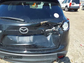 2013 Mazda CX-5 Touring with VIN JM3KE2CE3D0102368, listed as a IAAI auction lot 41783079 with 162,646 mi miles and . Bid and sale history available at carsss.com. Image 6.