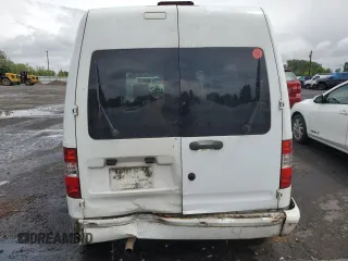 2010 Ford Transit Connect XLT with VIN NM0LS6BN1AT018703, listed as a Copart auction lot 56548575 with 184,017 mi miles and Salvage title. Bid and sale history available at DreamBid. Image 6.