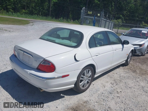 2003 Jaguar S-Type with VIN SAJEA01U93HM89560, listed as a IAAI auction lot 42115289 with 236,905 mi miles and . Bid and sale history available at DreamBid. Image 4.