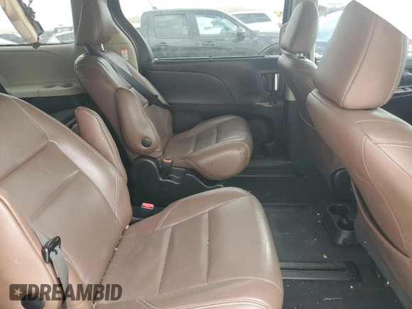 2015 Toyota Sienna Limited с VIN 5TDDK3DC6FS116164, выставлен на аукционе Copart как лот 63149625 с пробегом 92 786 миль миль и Списание • Salvage title. История ставок и продаж доступна на DreamBid. Изображение 11.