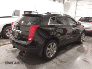2011 Cadillac SRX Performance Collection with VIN 3GYFNEEY9BS675746, listed as a IAAI auction lot 41735676 with 113,079 mi miles and . Bid and sale history available at carsss.com. Image 4.