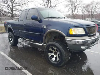 2003 Ford F-150 XL with VIN 1FTRX18L73NA26027, listed as a IAAI auction lot 41843867 with 1 mi miles. Bid and sale history available at carsss.com. Image 1.