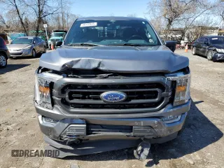 2021 Ford F-150 XL с VIN 1FTFW1E59MFC21571, выставлен на аукционе Copart как лот 50137835 с пробегом 16 887 миль миль и Списание • Salvage title. История ставок и продаж доступна на DreamBid. Изображение 5.