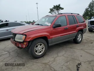 2002 Jeep Grand Cherokee Laredo z VIN 1J4GW48S72C221083, wystawiony jako Copart lot #60722945 z przebiegiem 81 043 mil mil oraz Czysty tytuł • Clean title. Historia ofert i sprzedaży dostępna na DreamBid. Obrazek 1.