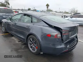 2022 Tesla Model S with VIN 5YJSA1E52NF459460, listed as a IAAI auction lot 41736236 with Not Provided miles and . Bid and sale history available at DreamBid. Image 3.
