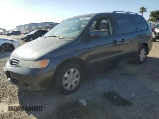 2004 Honda Odyssey EX-L with VIN 5FNRL18714B044439, listed as a Copart auction lot 53639215 with 65,433 mi miles and Salvage title. Bid and sale history available at DreamBid. Image 1.