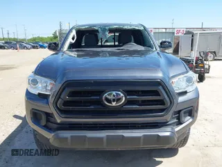 2020 Toyota Tacoma SR with VIN 3TYRX5GNXLT002488, listed as a IAAI auction lot 41973584 with 76,169 mi miles and . Bid and sale history available at DreamBid. Image 13.