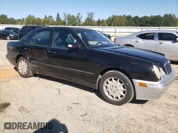 2000 Mercedes-Benz E-Class AWD with VIN WDBJF82JXYX035315, listed as a Copart auction lot 75568454 with 166,704 mi miles and Salvage Title. Bid and sale history available at carsss.com. Image 4.