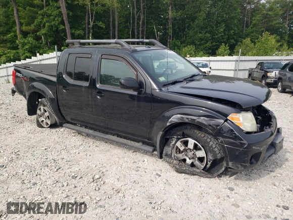 2011 Nissan Frontier Pro-4X with VIN 1N6AD0EV8BC451995, listed as a Copart auction lot 60950855 with 102,360 mi miles and Clean title. Bid and sale history available at DreamBid. Image 4.