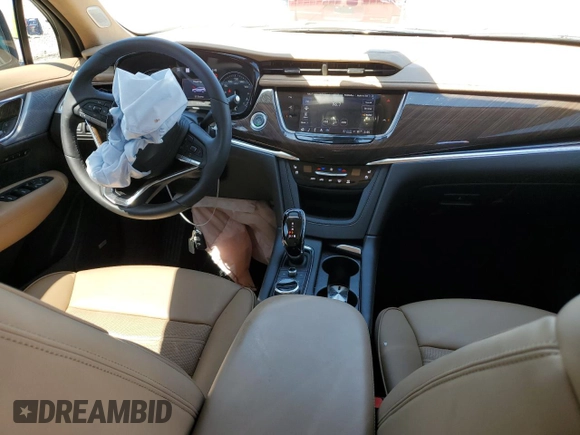 2023 Cadillac XT6 AWD Premium Luxury z VIN 1GYKPFRS2PZ162059, wystawiony jako Copart lot #63882963 z przebiegiem 6 567 mil mil oraz . Historia ofert i sprzedaży dostępna na DreamBid. Obrazek 8.