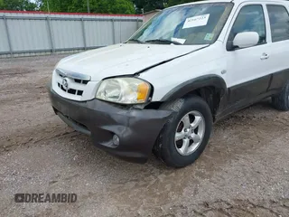 2006 Mazda Tribute i with VIN 4F2YZ02Z56KM31953, listed as a IAAI auction lot 42167223 with 185,169 mi miles and . Bid and sale history available at carsss.com. Image 6.