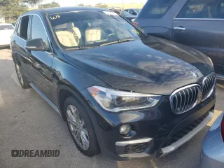 2018 BMW X1 xDrive28i with VIN WBXHT3C37J5K27694, listed as a Copart auction lot 64022772 with 59,413 mi miles. Bid and sale history available at carsss.com. Image 1.
