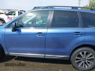 2017 Subaru Forester Touring with VIN JF2SJGWC5HH567870, listed as a IAAI auction lot 42007542 with 76,560 mi miles. Bid and sale history available at carsss.com. Image 14.