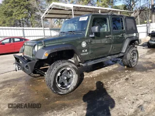 2007 Jeep Wrangler Unlimited X with VIN 1J4GB39117L205724, listed as a Copart auction lot 45698975 with 150,558 mi miles and Salvage title. Bid and sale history available at DreamBid. Image 1.