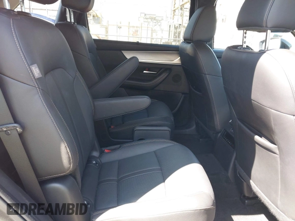 2025 Mazda CX-90 Premium Sport z VIN JM3KKCHAXS1206996, wystawiony jako IAAI lot #42086590 z przebiegiem 4 294 mil mil oraz . Historia ofert i sprzedaży dostępna na DreamBid. Obrazek 8.