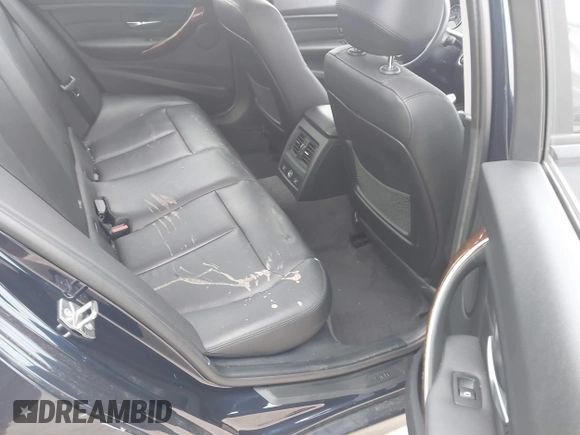 2015 BMW 3 Series 328i xDrive with VIN WBA3B3C54FJ984107, listed as a IAAI auction lot 41565829 with 98,557 mi miles and . Bid and sale history available at DreamBid. Image 8.