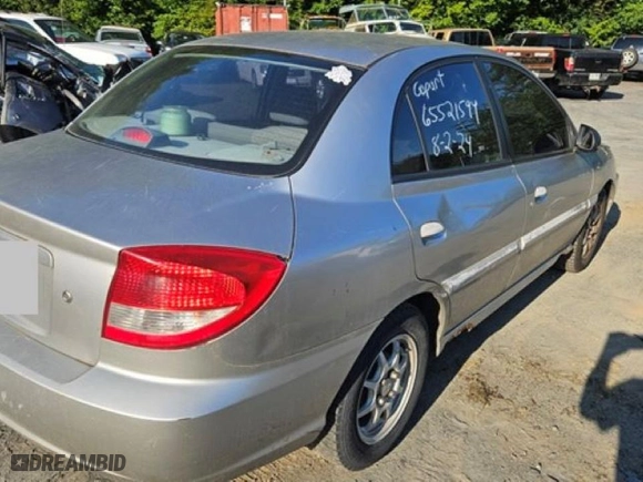 2004 Kia Rio with VIN KNADC125546325654, listed as a Copart auction lot 65521594 with 157,436 mi miles and Salvage Title. Bid and sale history available at carsss.com. Image 3.