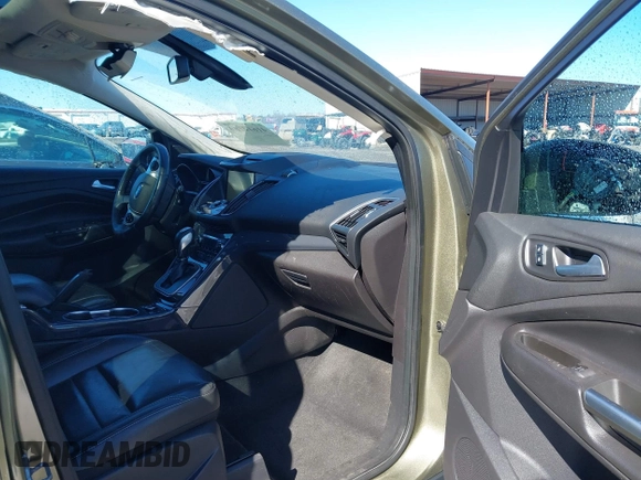 2013 Ford Escape Titanium with VIN 1FMCU9J99DUD46870, listed as a IAAI auction lot 41614409 with 141,739 mi miles and . Bid and sale history available at DreamBid. Image 5.