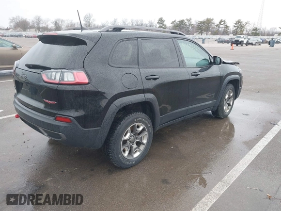2019 Jeep Cherokee Trailhawk Elite with VIN 1C4PJMBX6KD418409, listed as a IAAI auction lot 41178690 with 80,755 mi miles. Bid and sale history available at carsss.com. Image 4.