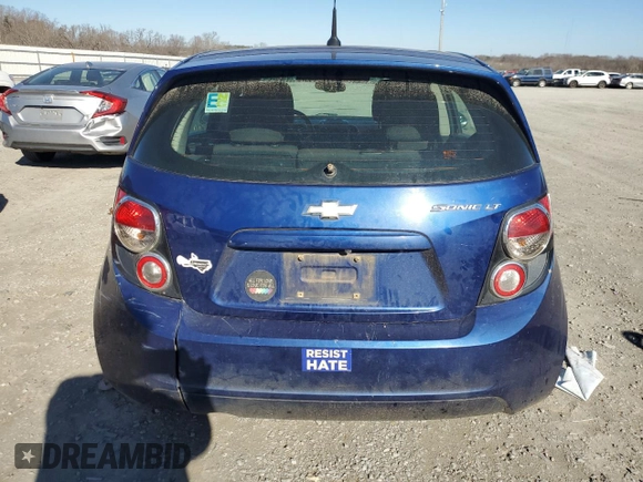 2014 Chevrolet Sonic LT with VIN 1G1JC6SH4E4205072, listed as a Copart auction lot 87321804 with 185,736 mi miles and Clean Title. Bid and sale history available at carsss.com. Image 6.