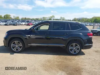 2019 Volkswagen Atlas SEL R-Line z VIN 1V2RR2CA0KC579035, wystawiony jako IAAI lot #42205407 z przebiegiem 66 188 mil mil oraz . Historia ofert i sprzedaży dostępna na DreamBid. Obrazek 14.