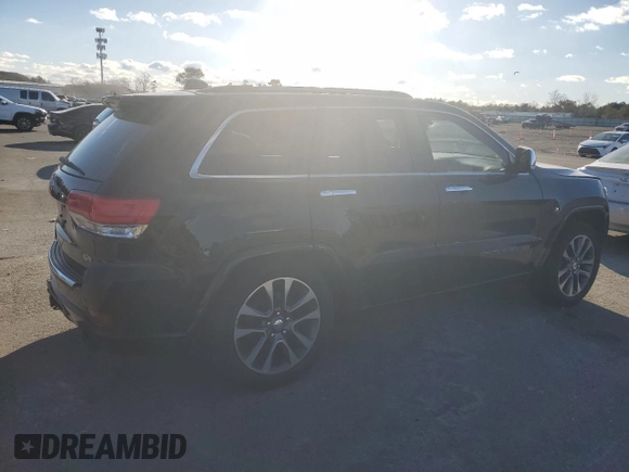 2017 Jeep Grand Cherokee Overland with VIN 1C4RJFCT9HC822898, listed as a Copart auction lot 86567034 with 120,699 mi miles and Salvage Title. Bid and sale history available at carsss.com. Image 3.