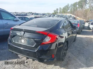 2021 Honda Civic Sedan Sport with VIN 2HGFC2F86MH532639, listed as a IAAI auction lot 41613728 with 50,071 mi miles. Bid and sale history available at carsss.com. Image 4.