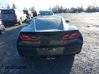 2014 Chevrolet Corvette Z51 3LT z VIN 1G1YM2D79E5121445, wystawiony jako IAAI lot #41652476 z przebiegiem 56 988 mil mil oraz . Historia ofert i sprzedaży dostępna na DreamBid. Obrazek 16.