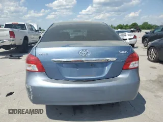 2009 Toyota Yaris with VIN JTDBT903191331207, listed as a Copart auction lot 54570165 with 232,601 mi miles and Salvage Title. Bid and sale history available at DreamBid. Image 6.
