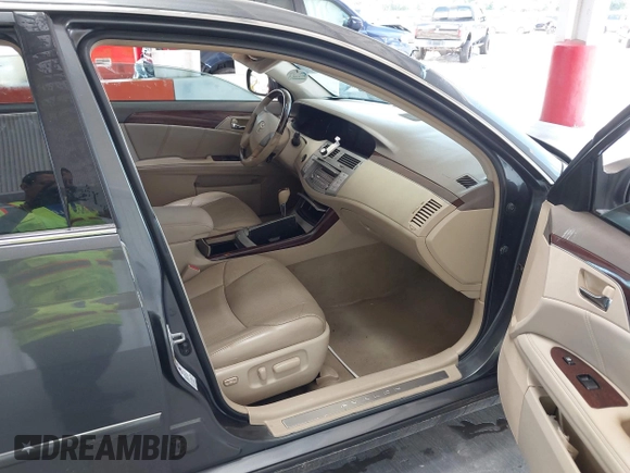 2009 Toyota Avalon XL with VIN 4T1BK36B19U348758, listed as a IAAI auction lot 39746698 with 141,454 mi miles and . Bid and sale history available at DreamBid. Image 5.