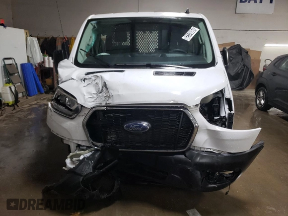 2023 Ford Transit Cargo with VIN 1FTBR1Y87PKA51654, listed as a Copart auction lot 82376064 with 18,442 mi miles and Clean Title. Bid and sale history available at DreamBid. Image 5.