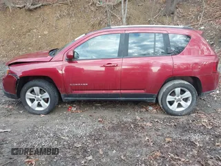 2016 Jeep Compass High Altitude with VIN 1C4NJDEB0GD779584, listed as a IAAI auction lot 41209135 with 143,624 mi miles and . Bid and sale history available at DreamBid. Image 14.